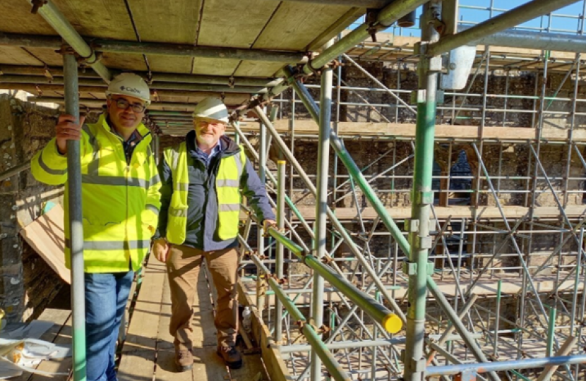 Monmouth MS Peter Fox and Chris Wilson, Head of Conservation at Cadw