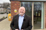 Peter Fox MS outside the Magor Hub